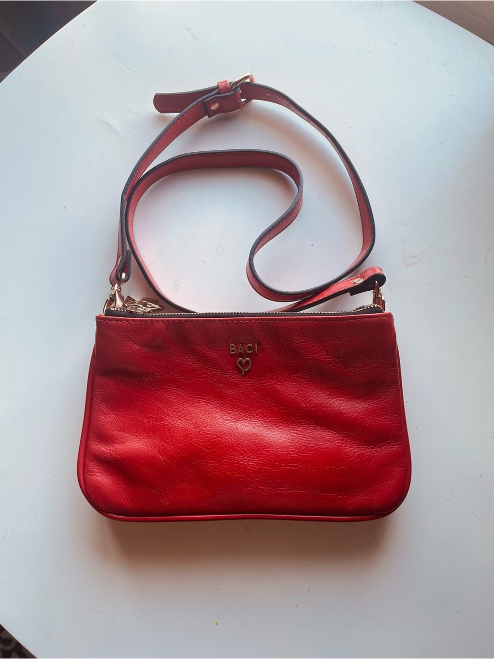 BACI Orange Leather Crossbody Bag with Heart Accent